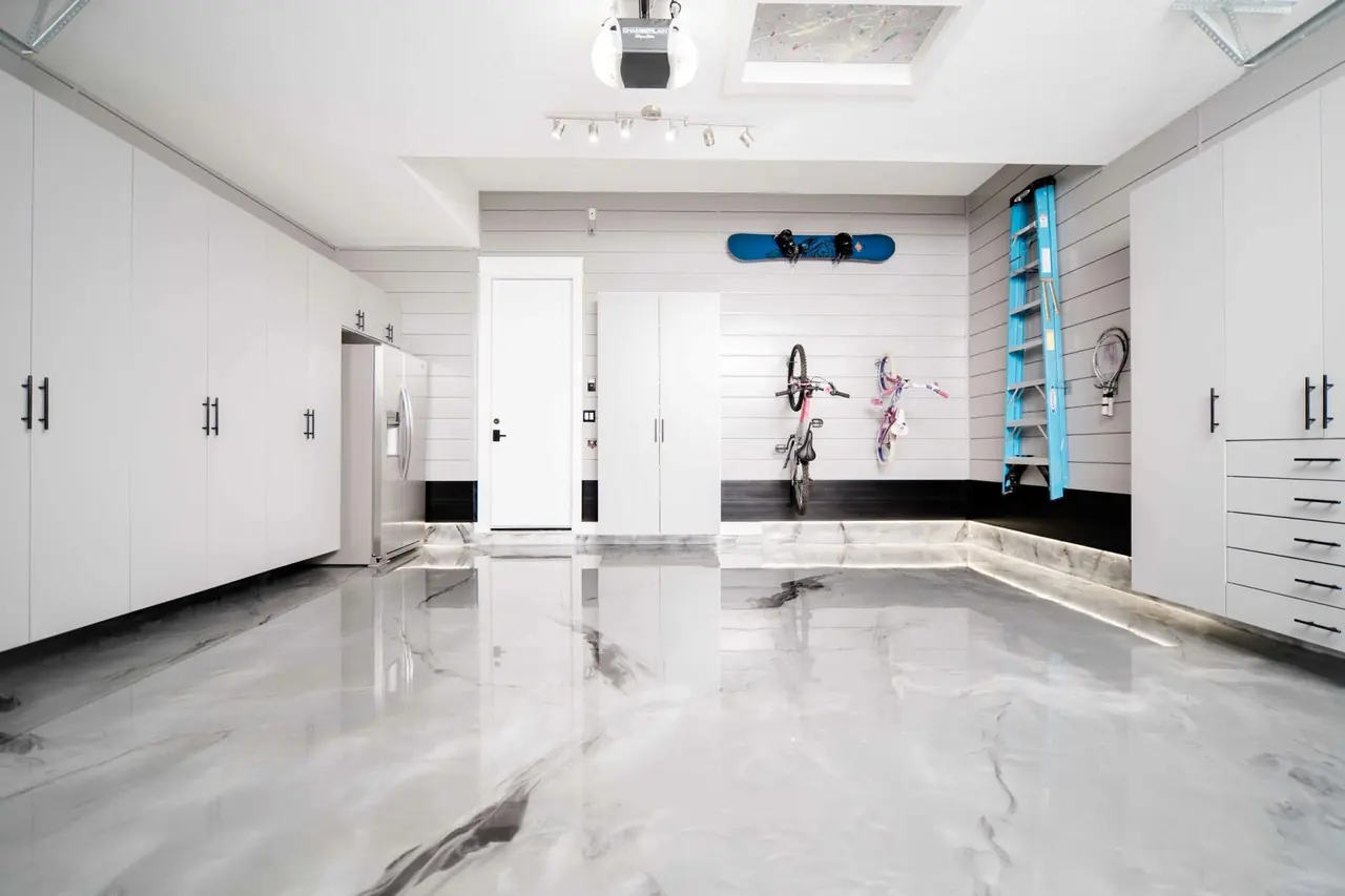 White metallic epoxy garage floor installed by 2020 Imagination Flooring